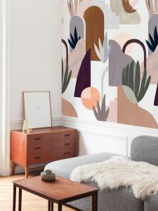 interieur decoré coloré canapé avec season paper tapisserie en arrière plan